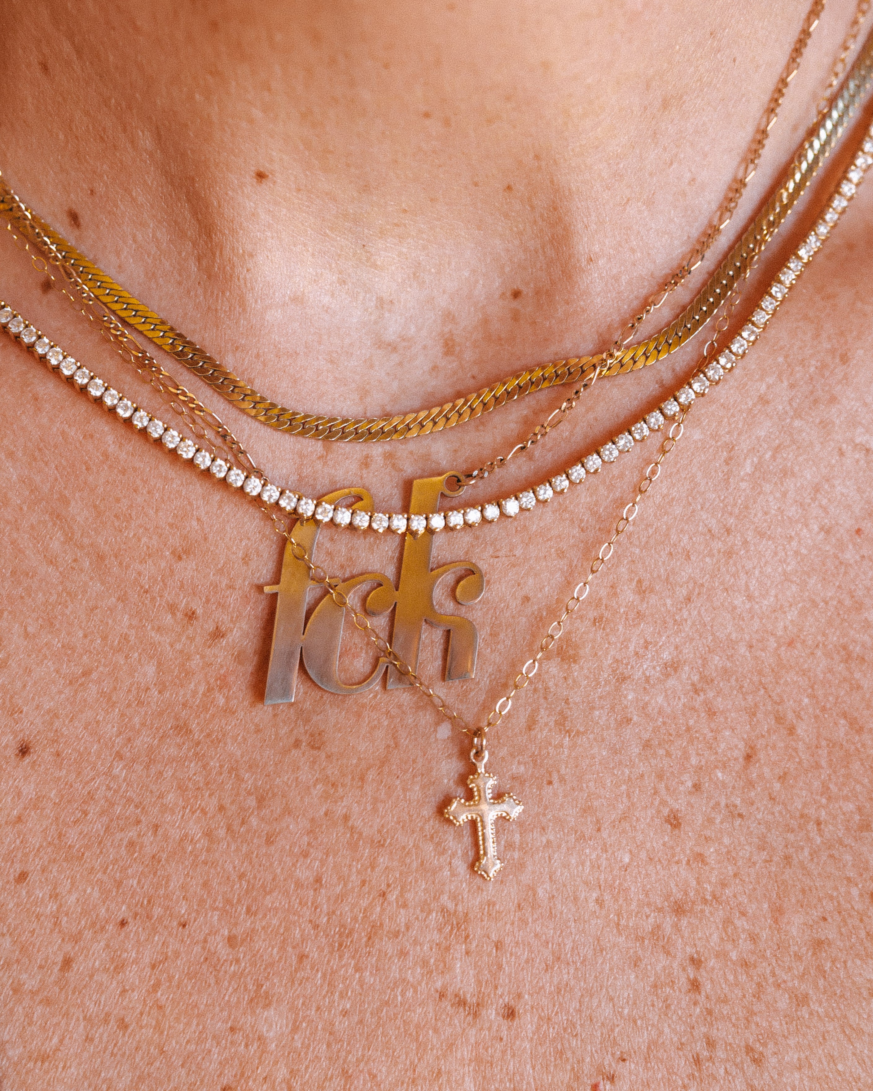 gold fck plate necklace