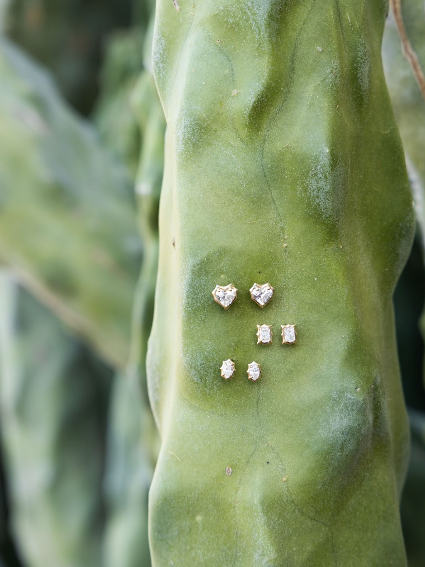 jagged gold x diamond solitaire earrings