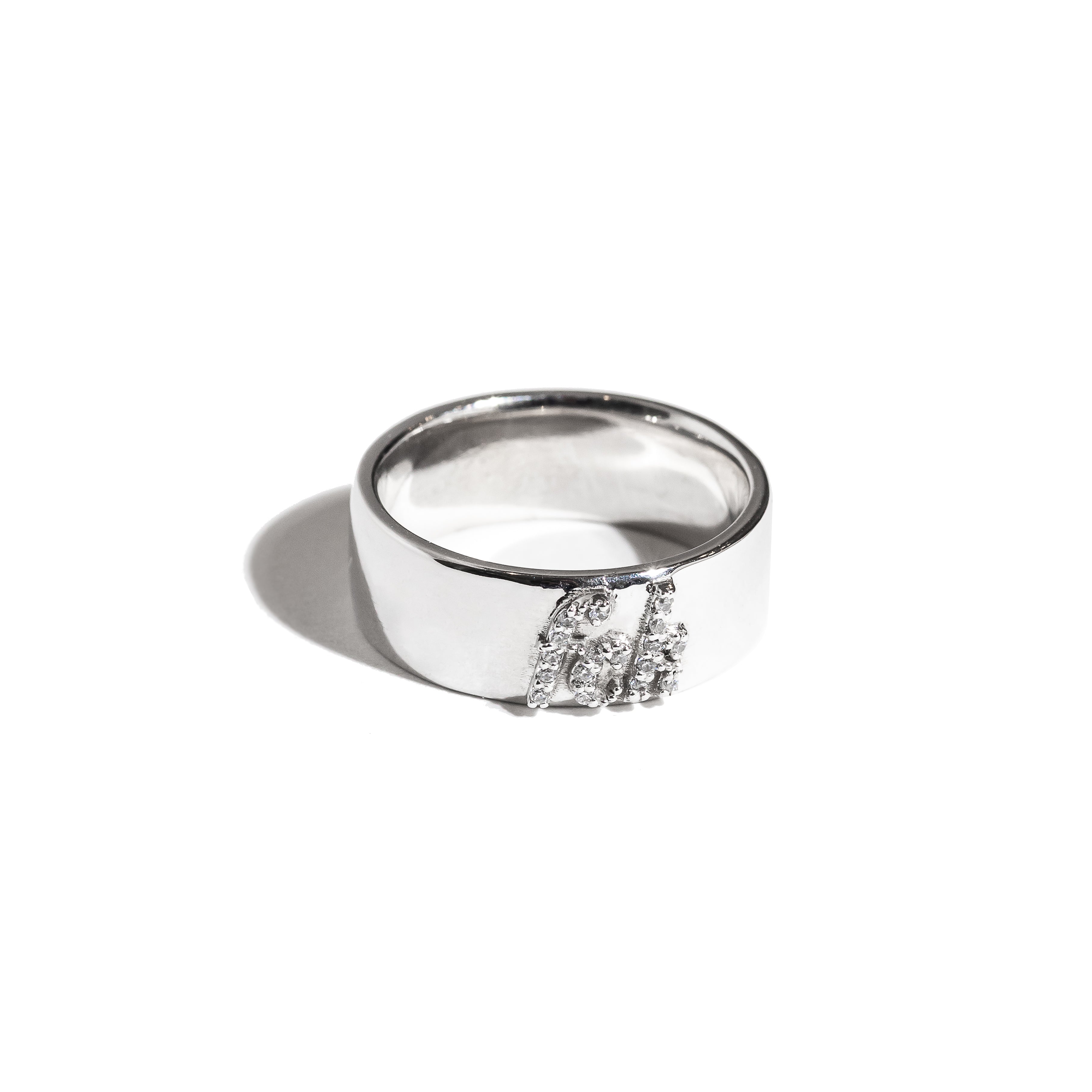 silver fck cigar band ring with pave cubic zirconias